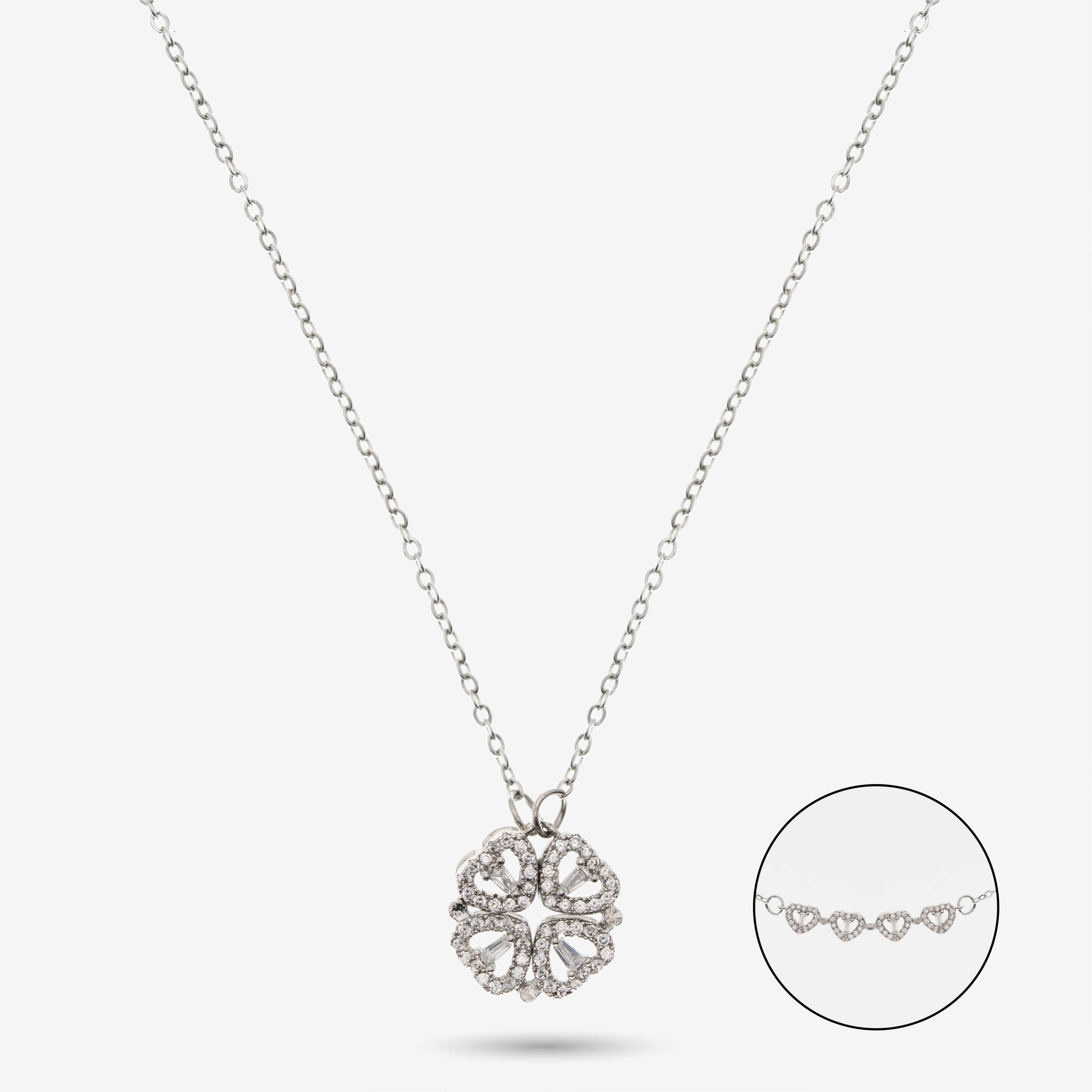 Herz-Kleeblatt Halskette aus Edelstahl in Silber mit glänzenden Steinen, romantisches Schmuckstück.